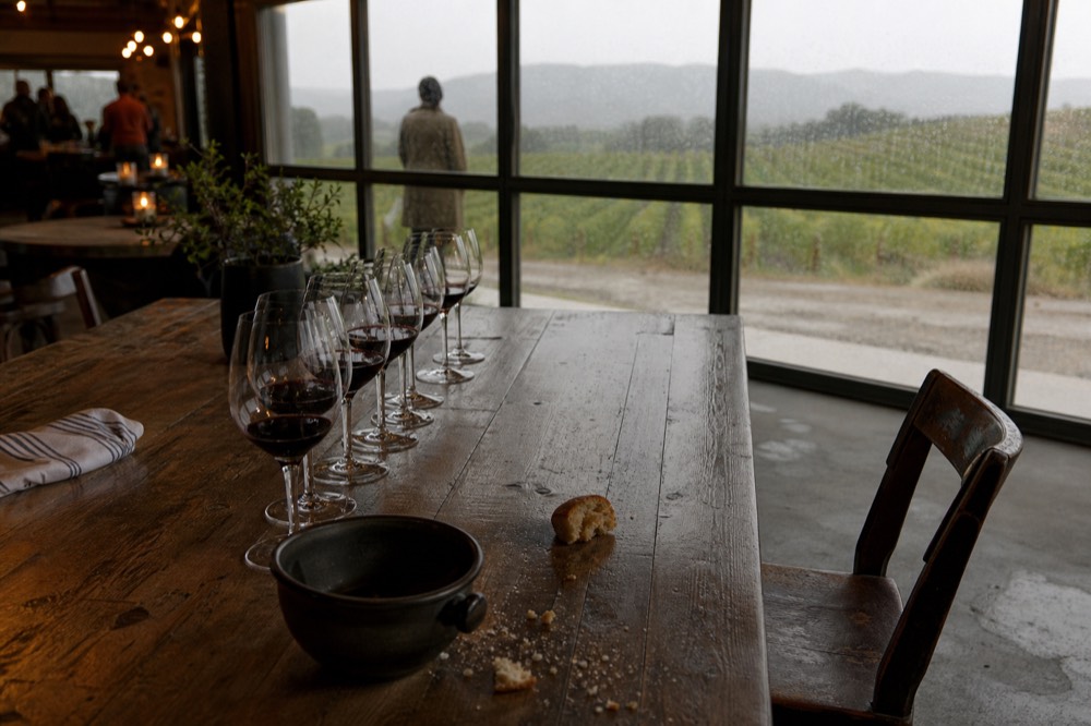 Wine tasting room with glasses, no text, no logos, no people
